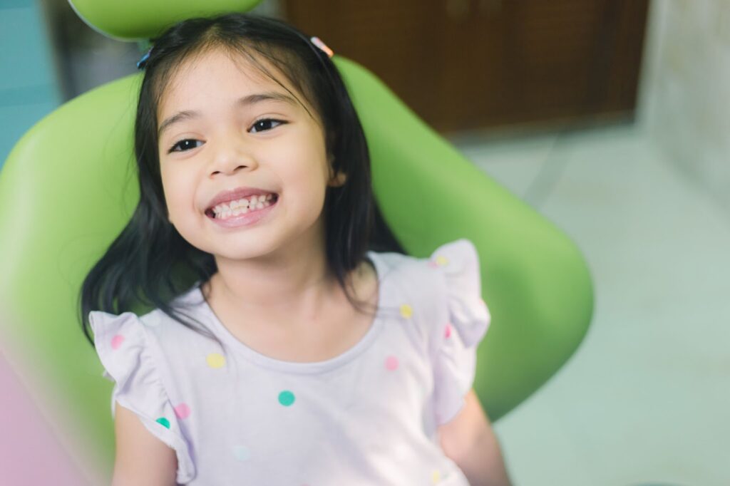 smiling child patient at orthodontic visit in jericho